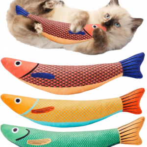 Cat playing with fish shaped catnip cat toy with bell